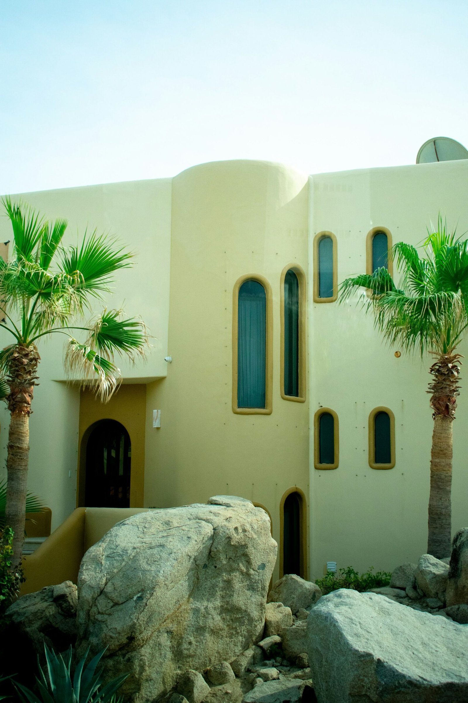 White Gulf-style building with palm trees near the coast in Al Khor, Qatar